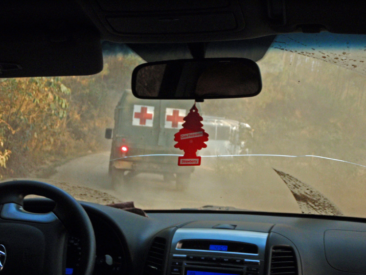 dusty road, cracked windshield